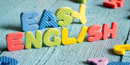 47534775 – english is easy to learning concept with letters on blue boards